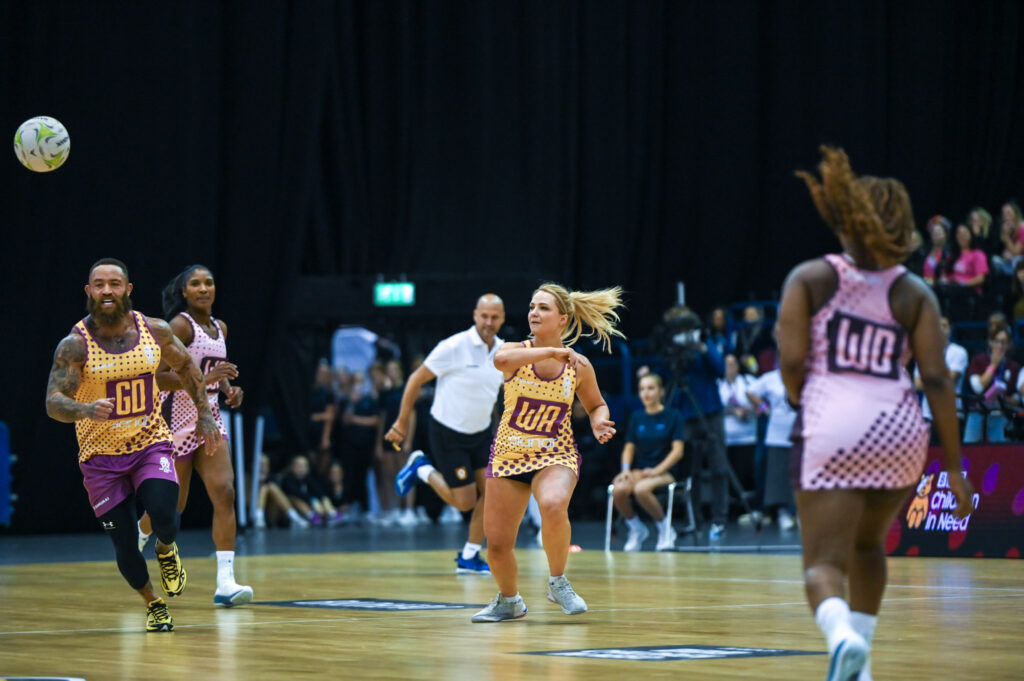 Players break up the court during the match